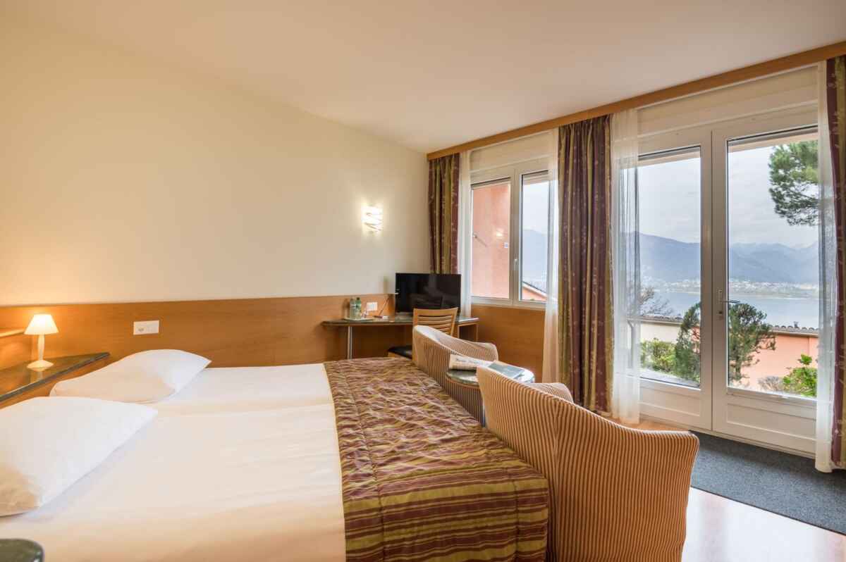 Zweibettzimmer mit Seesicht und Klimaanlage